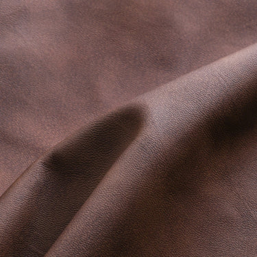 Three-quarter rear view of a men's harrington jacket showing back panel