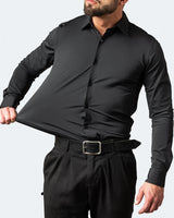 Front view of a men's white stretch shirt with button placket and classic collar