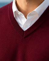 Close-up of ribbed collar and V-neckline detail on men's jumper