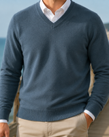 Back view of men's V-neck jumper showing ribbed hem detail