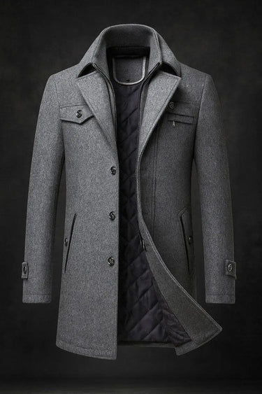 Detail shot of welt pocket, flap pocket, and chest zip pocket on the overcoat