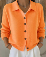 Close-up of toggle button front closure and ribbed knit fabric detail