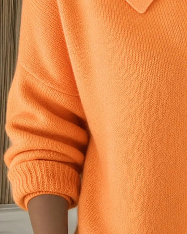 Full-length view of polo collar cardigan styled casually with trousers