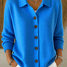 Relaxed-fit ribbed knit cardigan with polo collar and five toggle buttons, front view