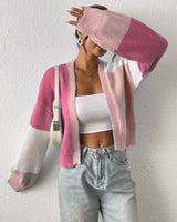 Back view of colour block cardigan showing ribbed hem detail