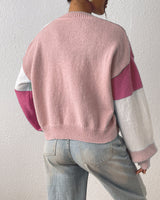Close-up of ribbed cuffs on colour block cropped cardigan