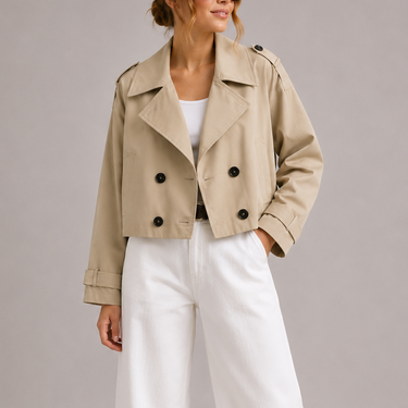 Close-up of the double-breasted button closure and wide lapel collar detail