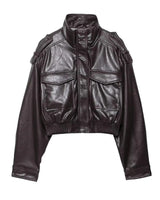 Detail of the ribbed hem and overall silhouette of the cropped jacket