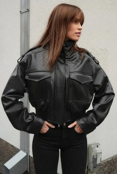 Close-up of the zip front and snap-button placket on the jacket