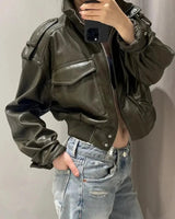 Close-up of the dual chest flap pockets on the front of the jacket