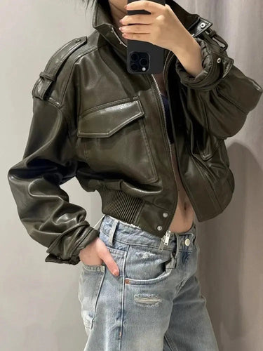 Close-up of the dual chest flap pockets on the front of the jacket