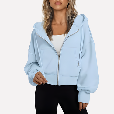 Cropped zip hoodie in taupe, detail view of zip and ribbed hem