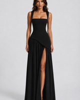 Detail of the asymmetric drape at the skirt of the maxi dress