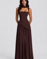 Detail shot of the asymmetric skirt hem and side slit