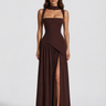 Front view of a satin-feel maxi dress with draped asymmetric skirt and side slit