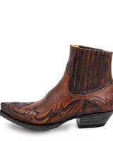 Men's Western slip-on ankle boot showing elastic side panel and embroidered stitching detail