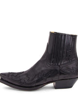 Men's Western ankle boot with embroidered upper, pointed toe, and stacked heel, side view