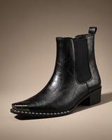 Faux leather chelsea boot with squared metal toe cap and stud trim detail