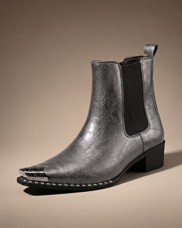 Rear view of chelsea boot with pull tab and low block heel