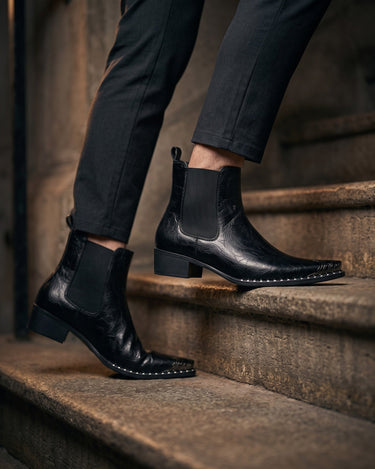 Overhead view of chelsea boot showing crinkled faux leather texture