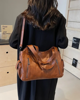 Close-up of the exterior front pocket with visible zip detail
