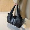 Front view of the faux leather shoulder bag showing the structured silhouette and dual straps