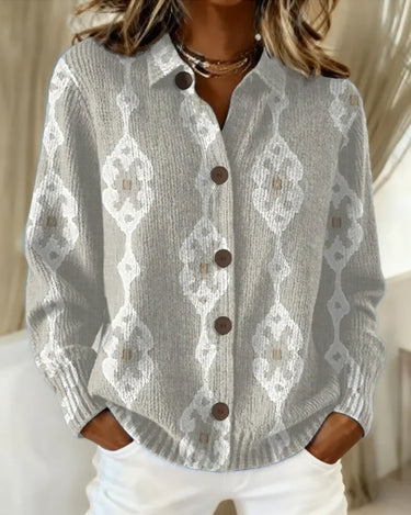 Front view of a fine knit polo jumper with button placket and ribbed hem