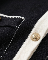Side view of fitted hip-length fine knit cardigan silhouette
