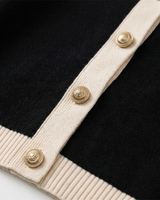 Back view of fitted fine knit cardigan with structured finish