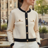 Fine knit cardigan with full-length gold button placket and two chest flap pockets