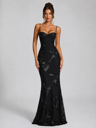 Full-length shot of the floral maxi dress from a slight angle