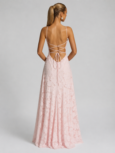 Side view showing the flowing full-length skirt and structured waist of the floral maxi dress