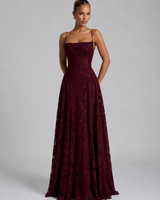 Three-quarter view of the floral maxi dress showing the silhouette and skirt movement