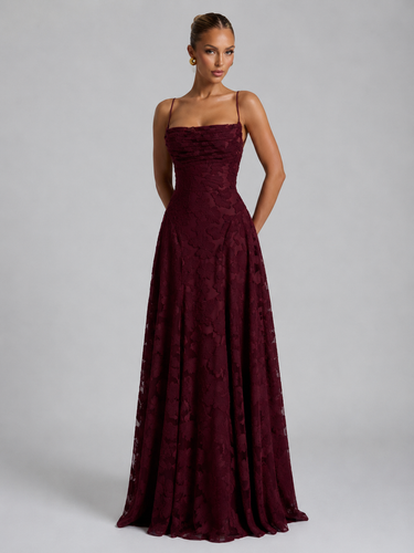 Three-quarter view of the floral maxi dress showing the silhouette and skirt movement
