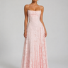 Front view of a floral maxi dress with fitted bodice and delicate shoulder straps