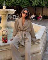 Full-length rear view of the khaki wide-leg trouser and kimono top co-ord set