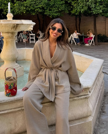 Full-length rear view of the khaki wide-leg trouser and kimono top co-ord set