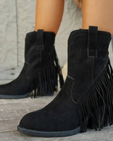 Detail shot of the pointed toe and block heel base