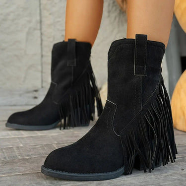 Detail shot of the pointed toe and block heel base