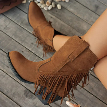Front view of suede cowboy boots with full-length fringe and pointed toe