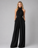 Detail shot of the discreet side pocket seam on the wide-leg jumpsuit