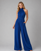 Back view of the sleeveless halter neck jumpsuit with open back detail