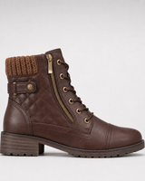 Close-up of side-zip fastening on leather ankle boot