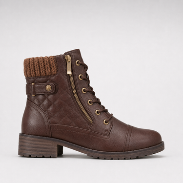 Close-up of side-zip fastening on leather ankle boot