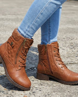 Leather ankle boots styled with straight-leg jeans