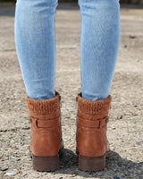 Sole view of low block heel ankle boots
