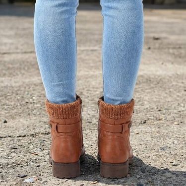 Sole view of low block heel ankle boots