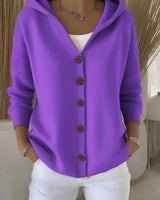 Model wearing the cardigan open over a casual outfit
