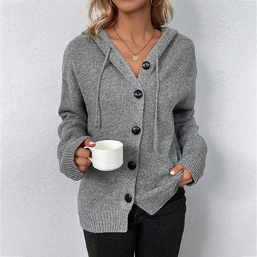 Close-up of the oversized buttons and knit texture on the cardigan front