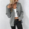 Front view of a hooded knit cardigan with large buttons down the full-length front